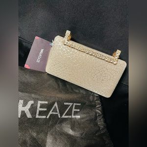 Gorgeous clutch purse with golden chain!BRAND NEW